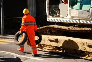 workerandtheexcavator.jpg